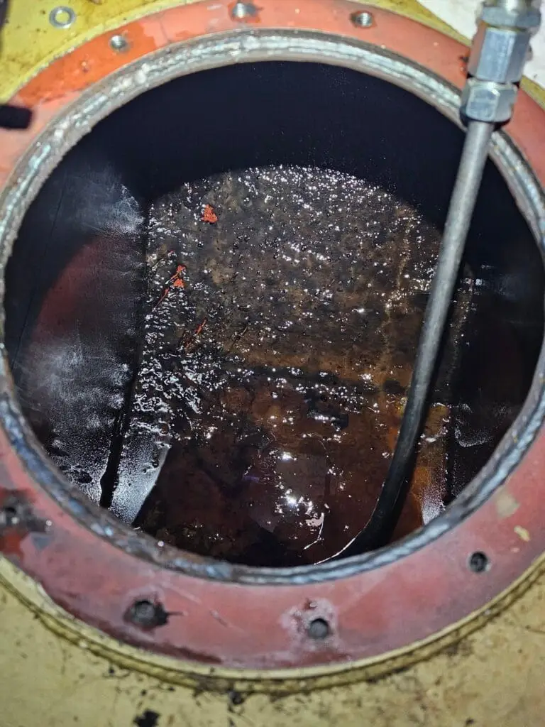 Contamination 6 a round metal container with a pipe